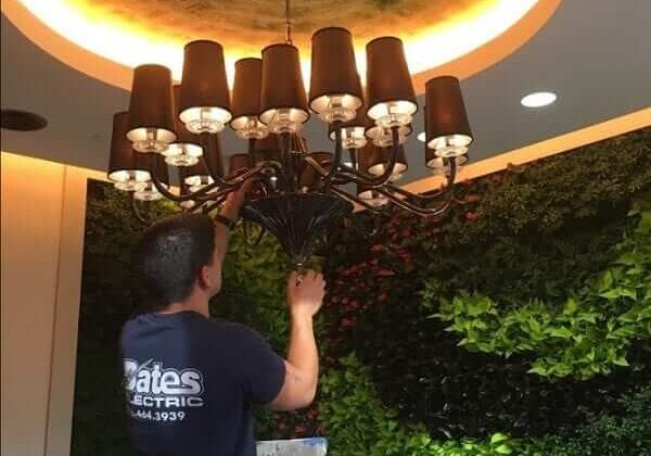 electrician fixing light